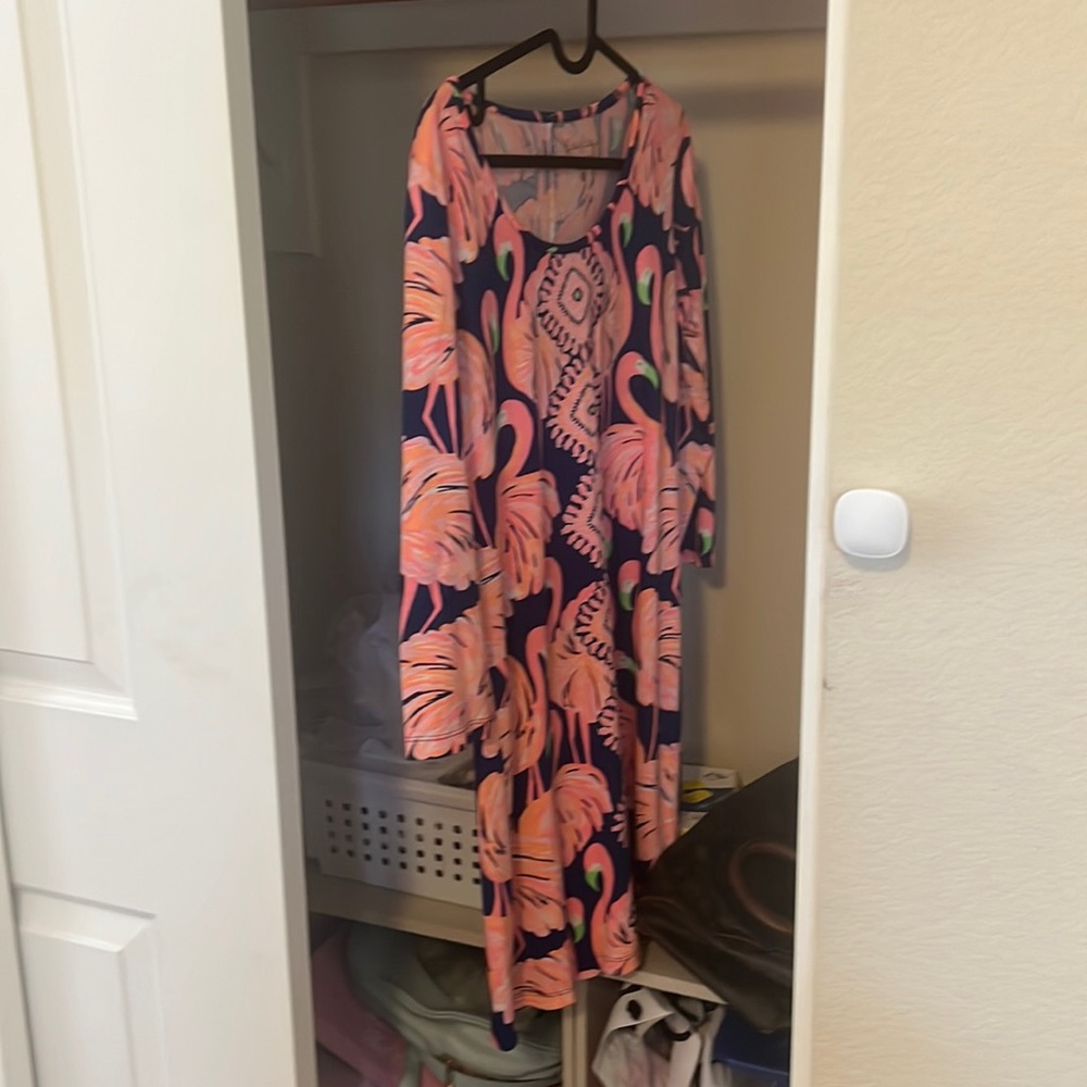 New condition dress, no flaws just selling because it doesn't quite suit me.